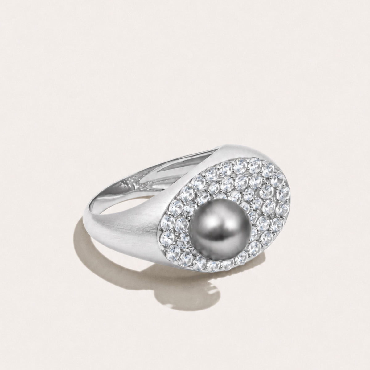 Angled view of the Audrey Étoile Ring, showcasing a silver freshwater cultured pearl and natural white zircon pavé in sterling silver.