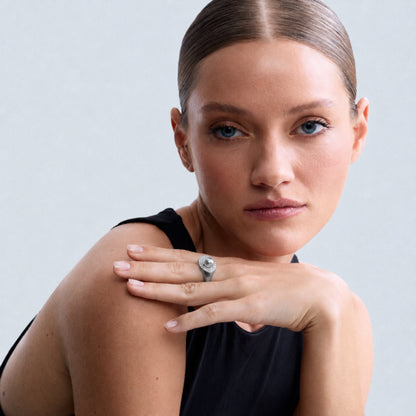 Model wearing the Audrey Étoile Ring in sterling silver featuring a silver freshwater cultured pearl and natural white zircon pavé.