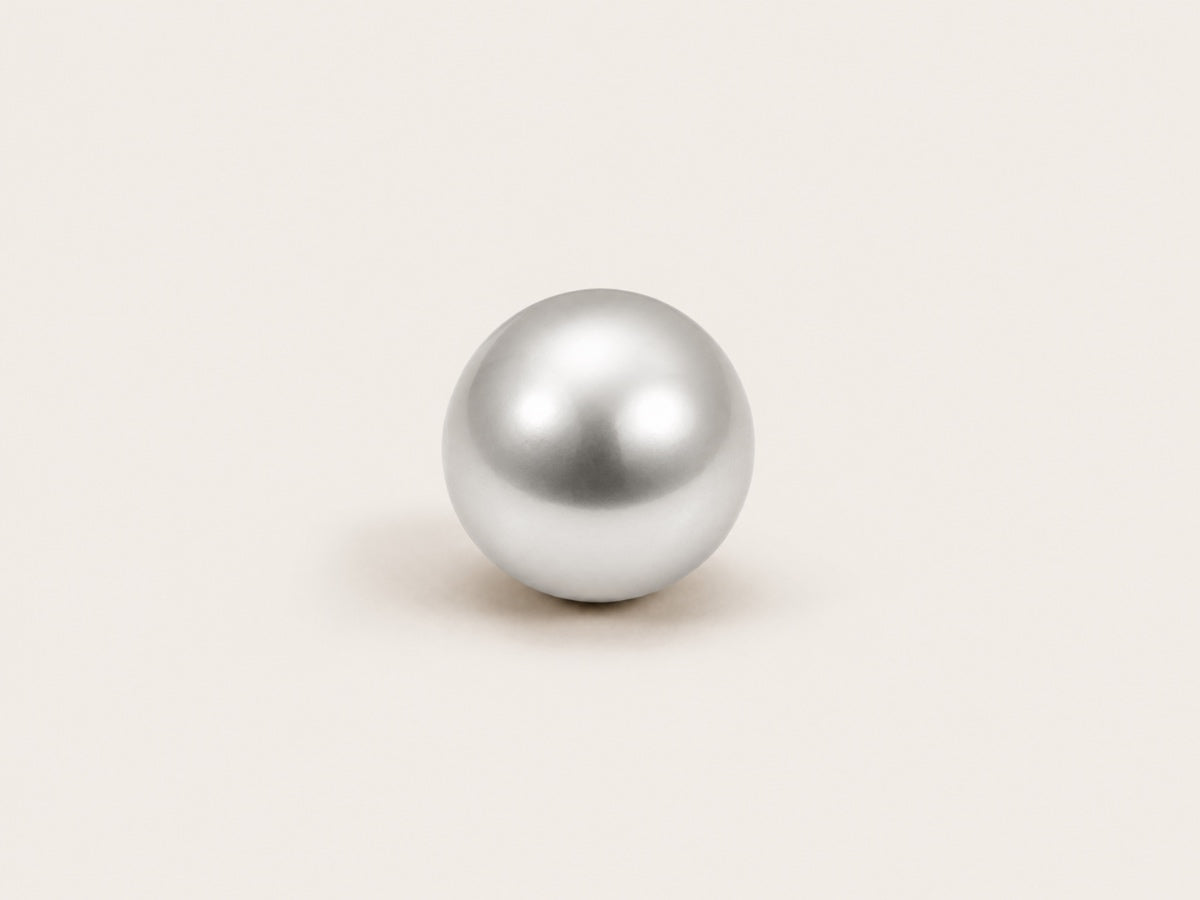 Silver freshwater cultured pearl with a smooth, lustrous finish used in Fierce Pearls jewelry.